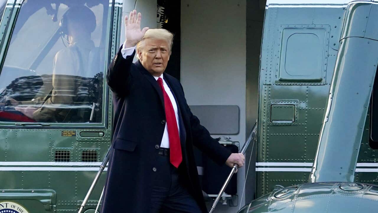 President Donald Trump waves as he boards Marine One on the South Lawn of the White House, 20 January, 2021, in Washington DC.