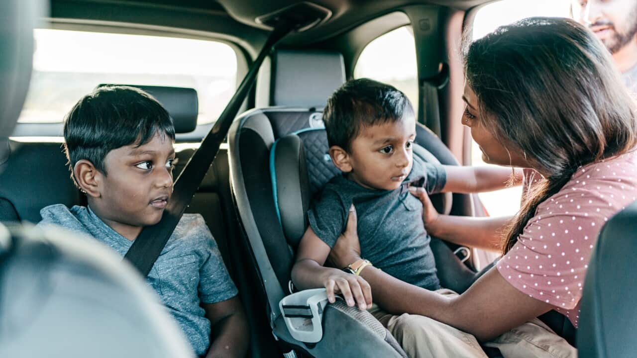 Road adventure - family with kids using the car