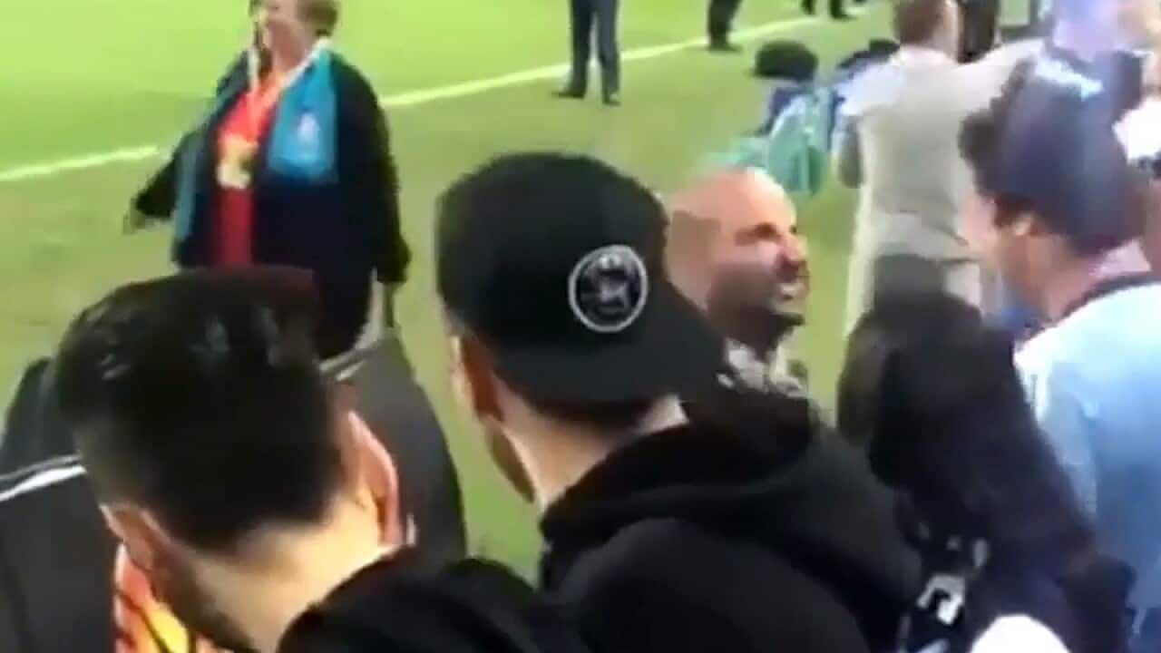 George Calombaris reacting after being heckled by Sydney FC supporters