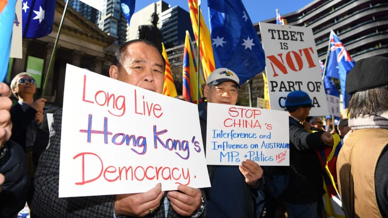 Pro democracy Hong Kong supporters gather at a demonstration outside of the State Library of Victoria.