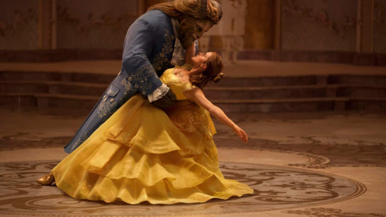 his image released by Disney shows Emma Watson as Belle and Dan Stevens as the Beast in "Beauty and the Beast," a live-action adaptation of the studio's animate
