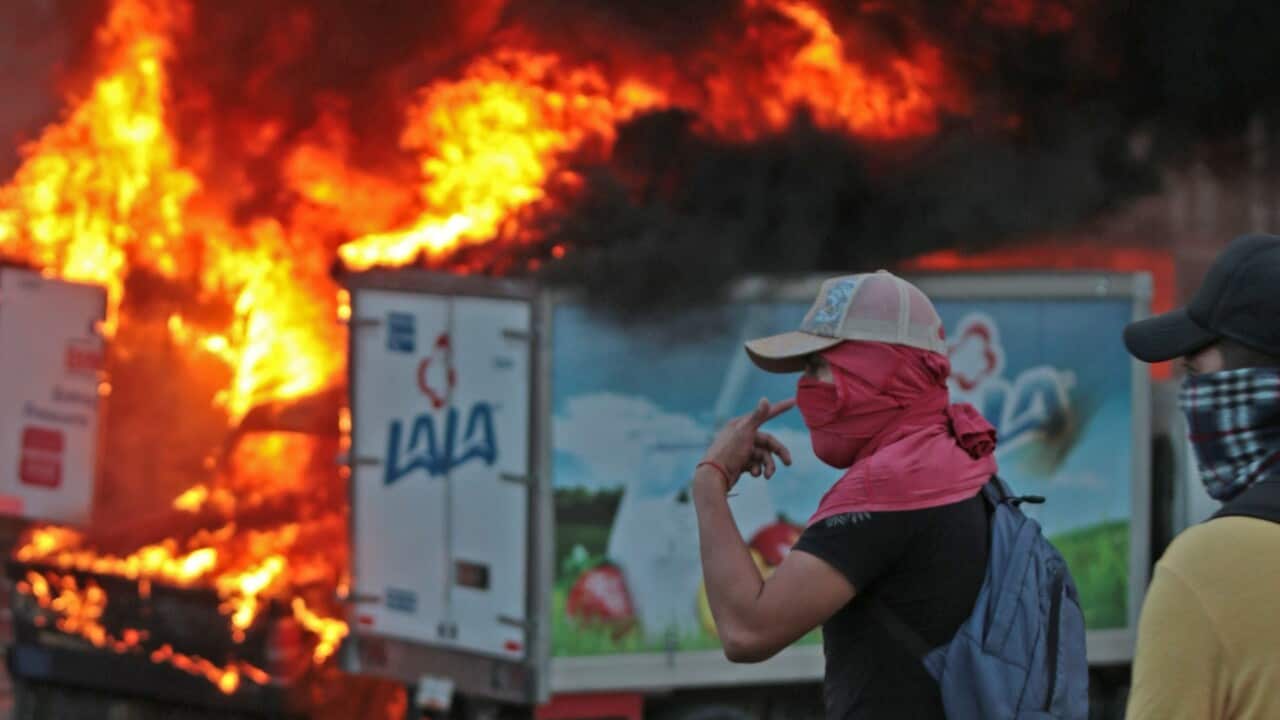 Violent riots in Mexico City in response to massacre of students