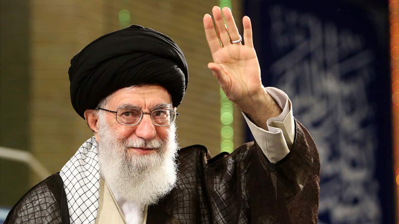 Supreme Leader Ayatollah Ali Khamenei waves to the crowd during his meeting with a group of labors in Tehran, Iran, Monday, April 30, 2018.