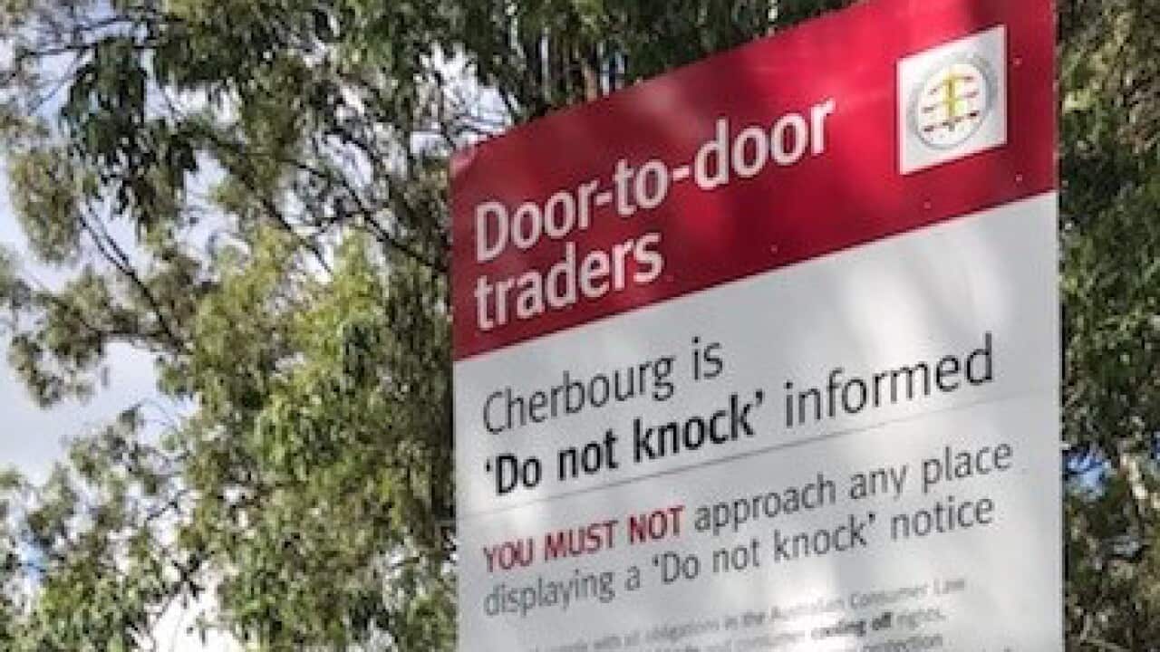 Cherbourg do not knock signage