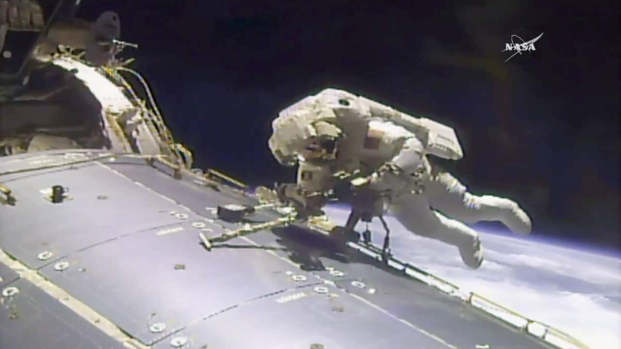 In this image made from video provided by NASA, astronaut Jack Fischer works outside the International Space Station on Friday