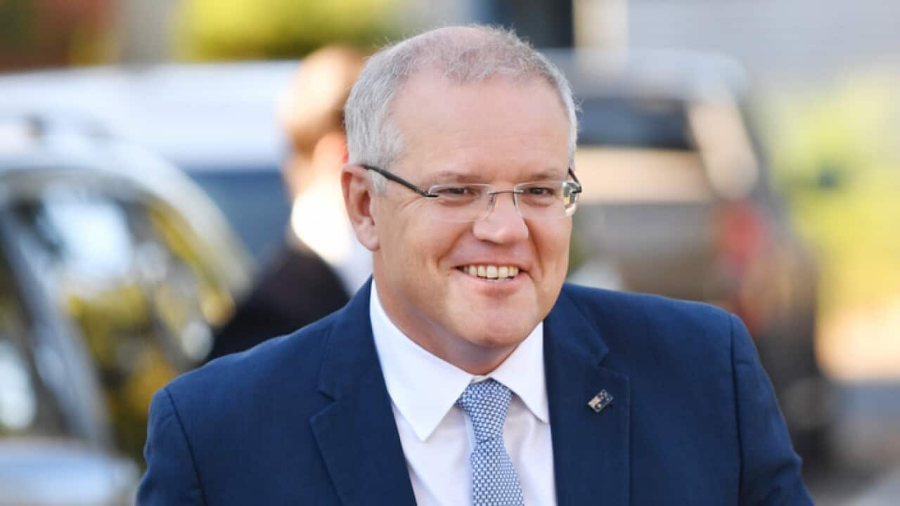 PM defends slashing annual migrant intake by 30,000 places