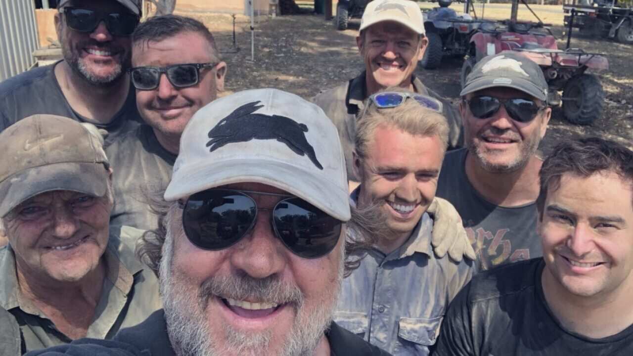 Russell Crowe with firefighters near Coffs Harbour.