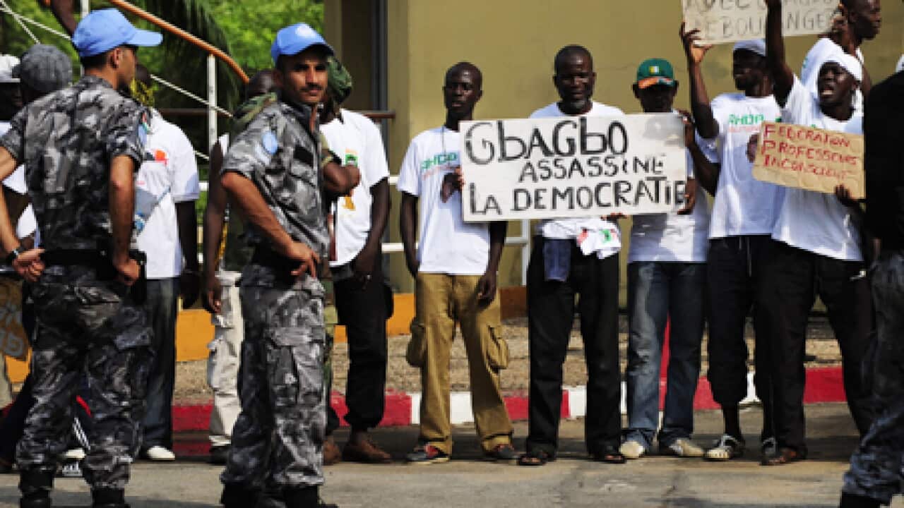 ivory_gbagboprotest_b_101229_afp_124111992