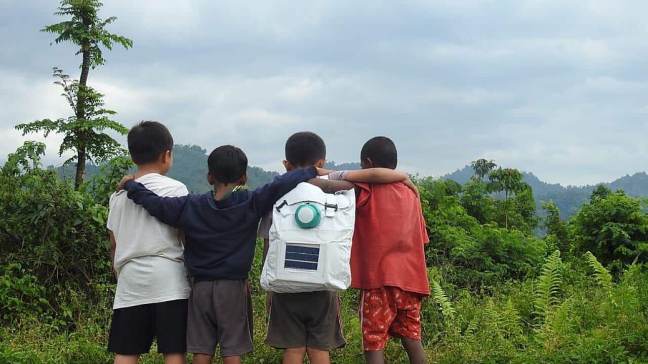 A child carrying a solar Jugnu Bag