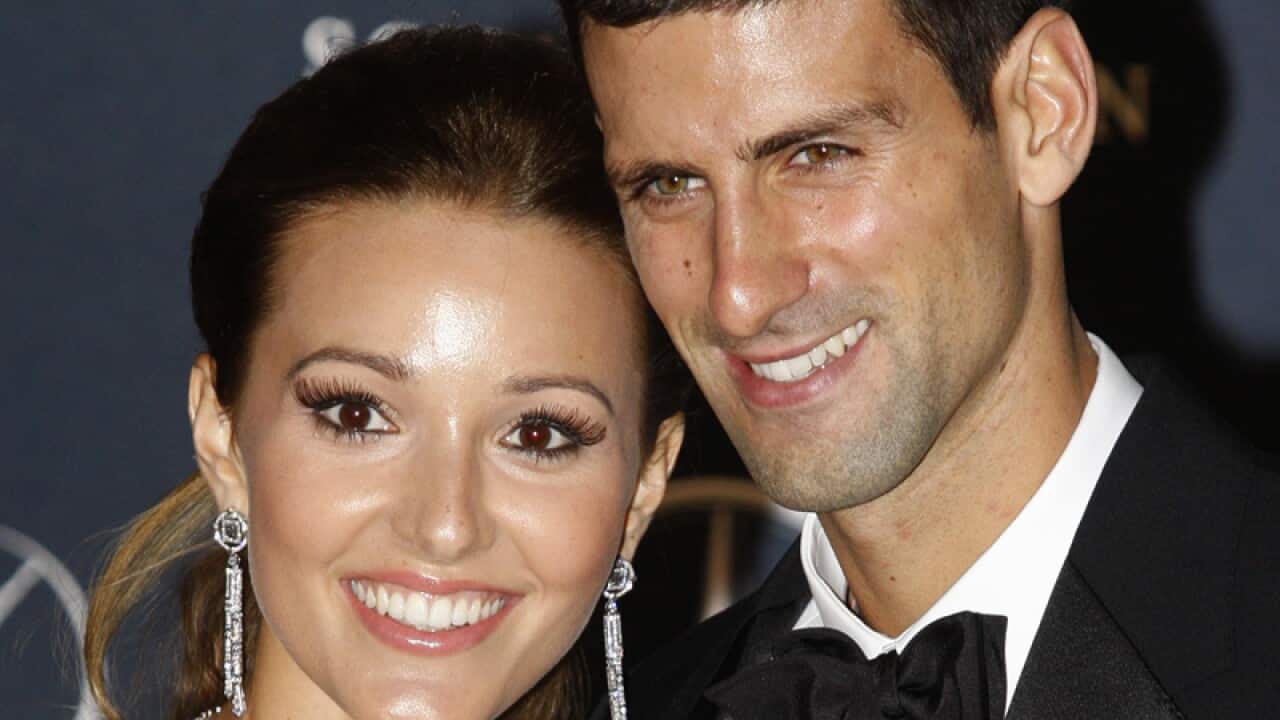 Novak Djokovic, right, arrives with his girlfriend Jelena Ristic