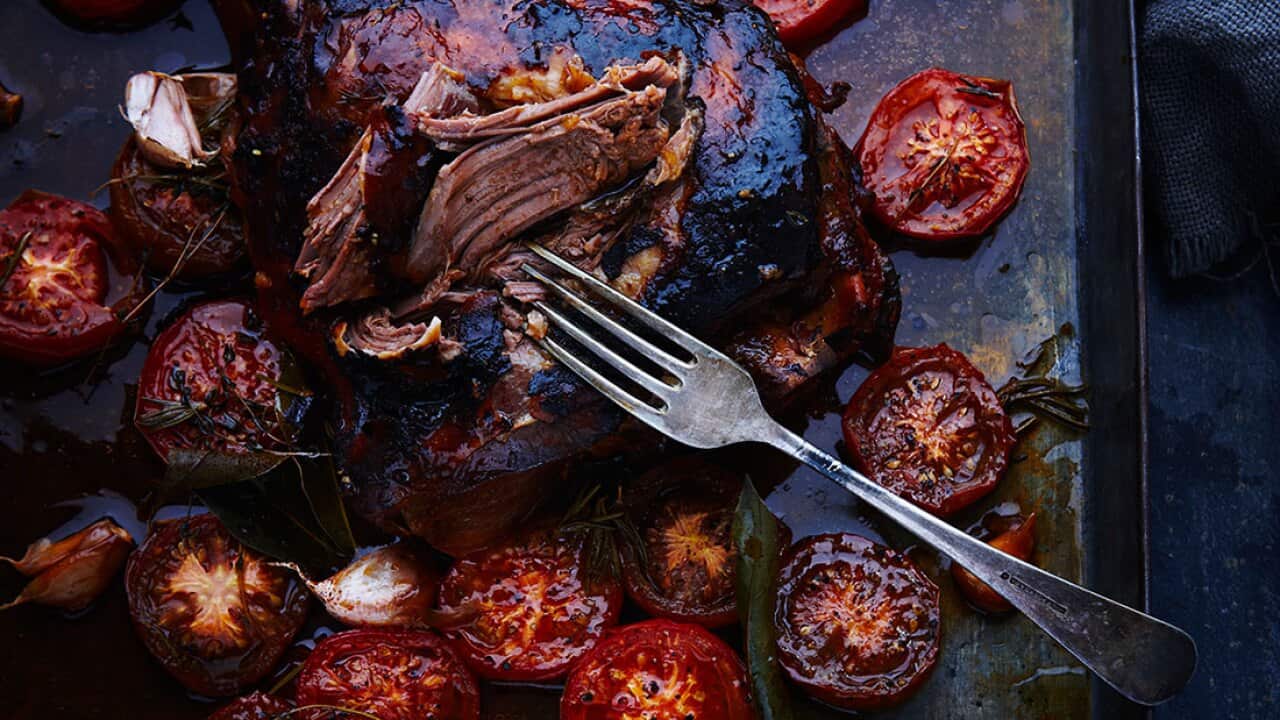 Slow-roast leg of lamb with tomato and garlic crust