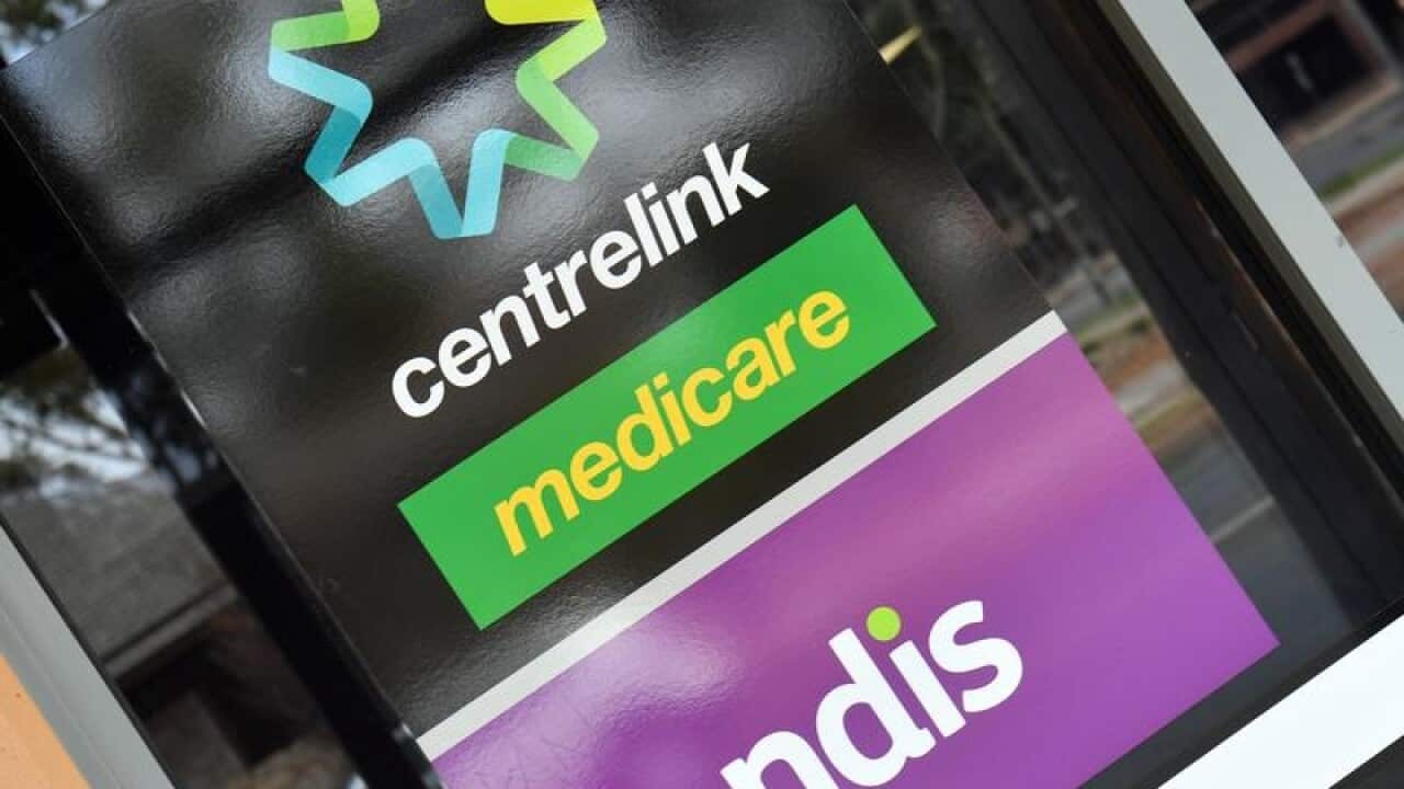 A Centrelink and NDIS sign.