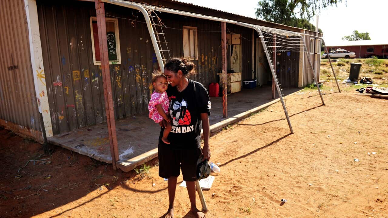 21-year-old Naronda William Loy with her 1-year-old daughter Karlishia Raggatt in her hometown of Mosquito Bore, Utopia, Saturday, Oct. 8 2011.