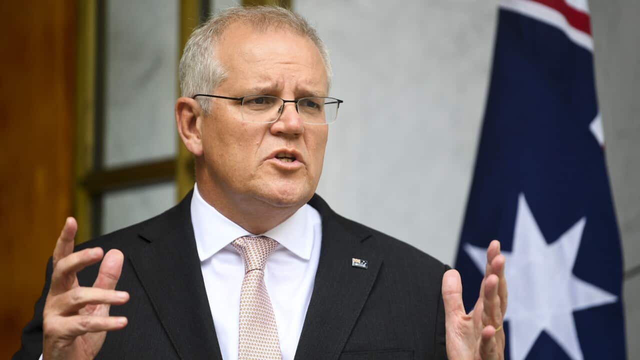 Australian Prime Minister Scott Morrison speaks to the media during a press conference following a national cabinet meeting, at Parliament House in Canberra, Thursday, January 13, 2022. (AAP Image/Lukas Coch) NO ARCHIVING
