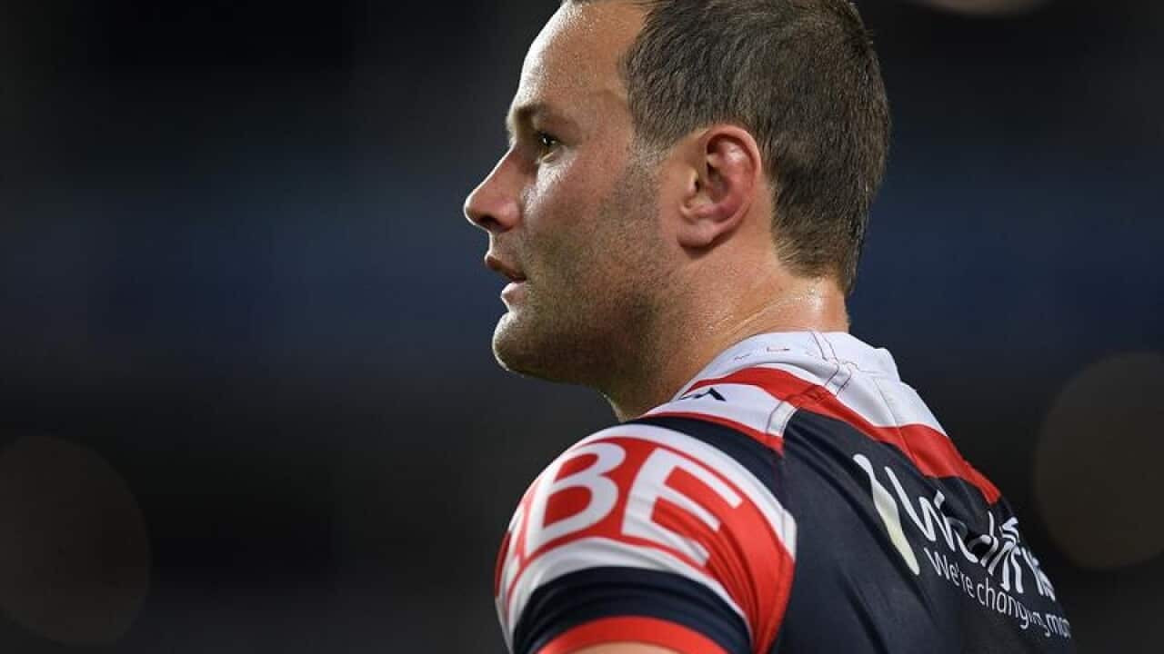 Boyd Cordner of the Roosters looks on
