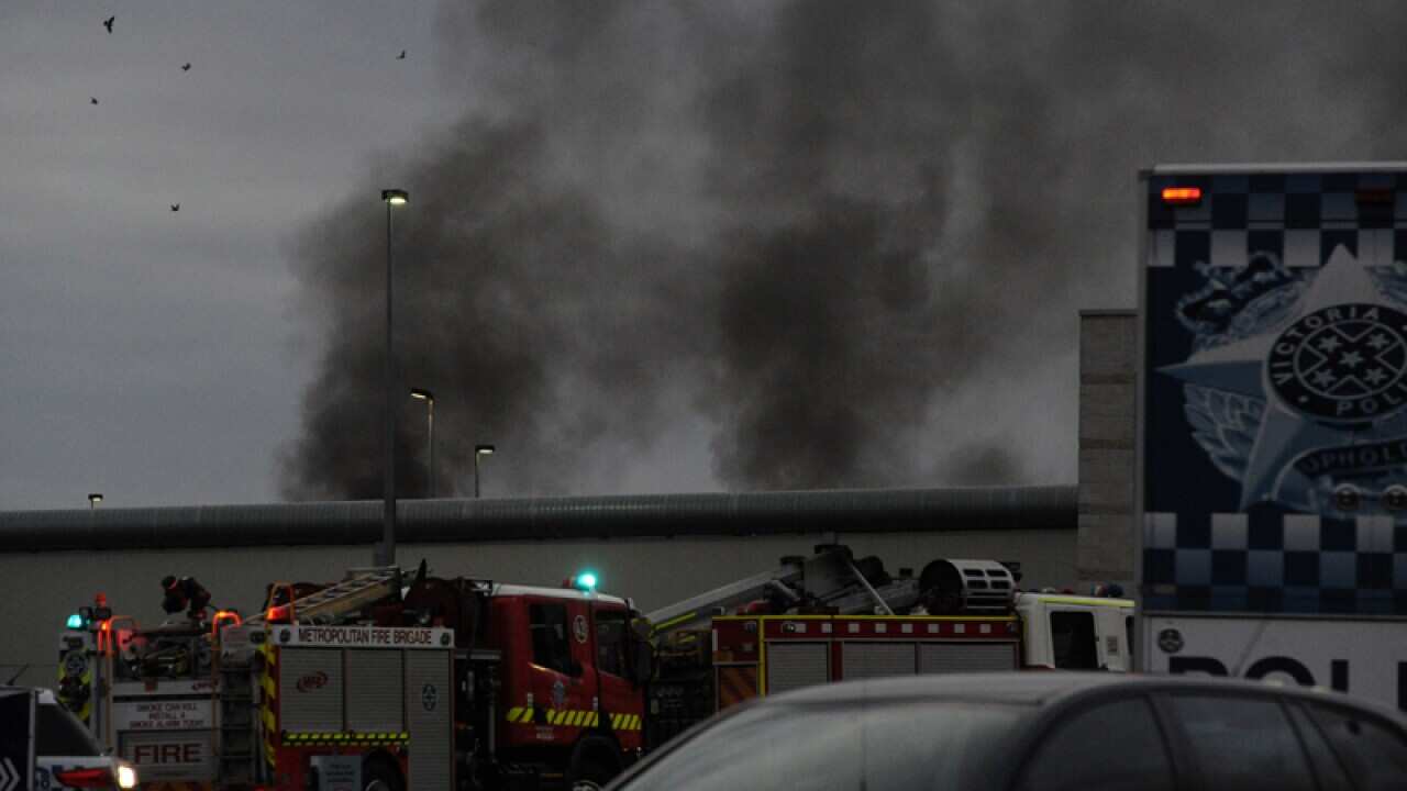 Smoke rises from Ravenhall Prison during a riot