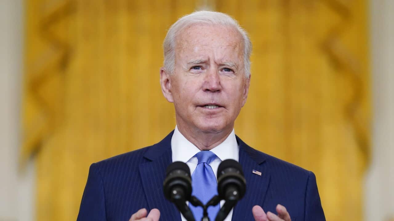 US President Joe Biden delivers remarks at the East Room of the White House