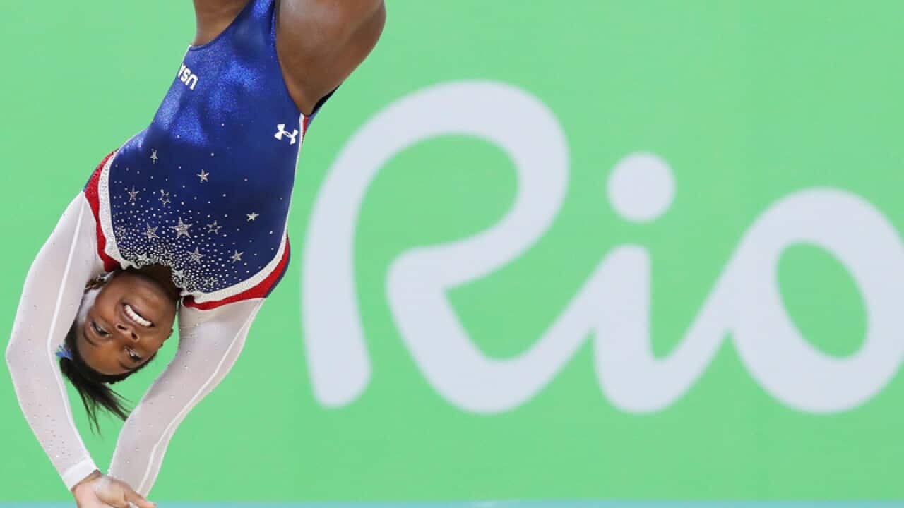 Simone Biles of the USA competes on the Floor