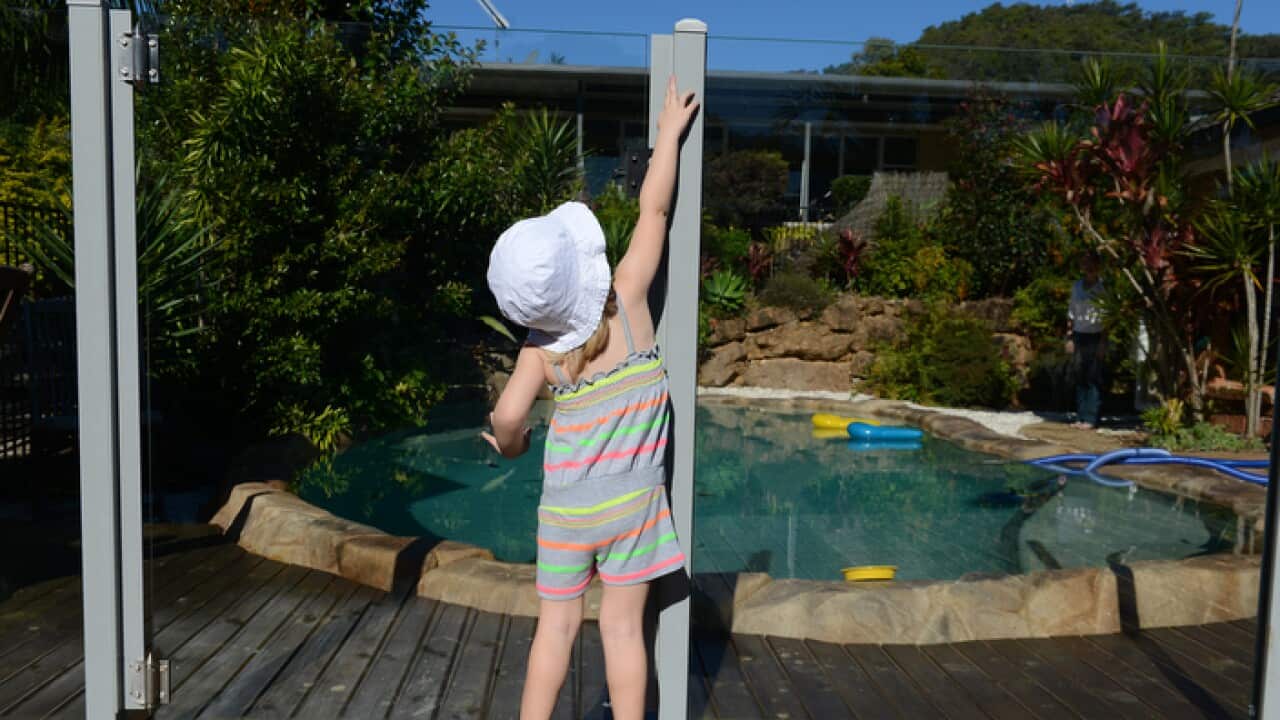 Generic photo of a child attempting to enter a swimming pool enclosure. (AAP Image/Dave Hunt) NO ARCHIVING