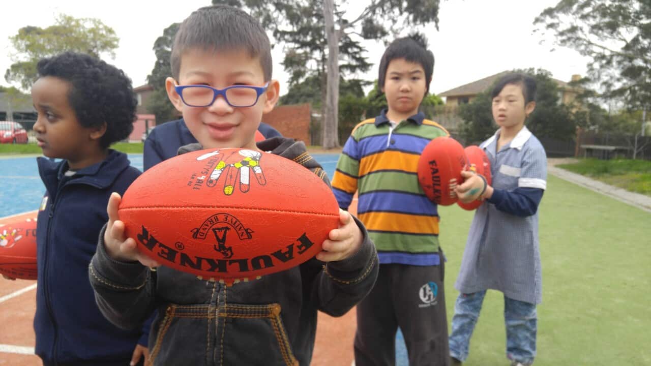 Footys4All delivers free sporting balls to disadvantaged kids globally. Here is Bryan in Melbourne. Philip Ly