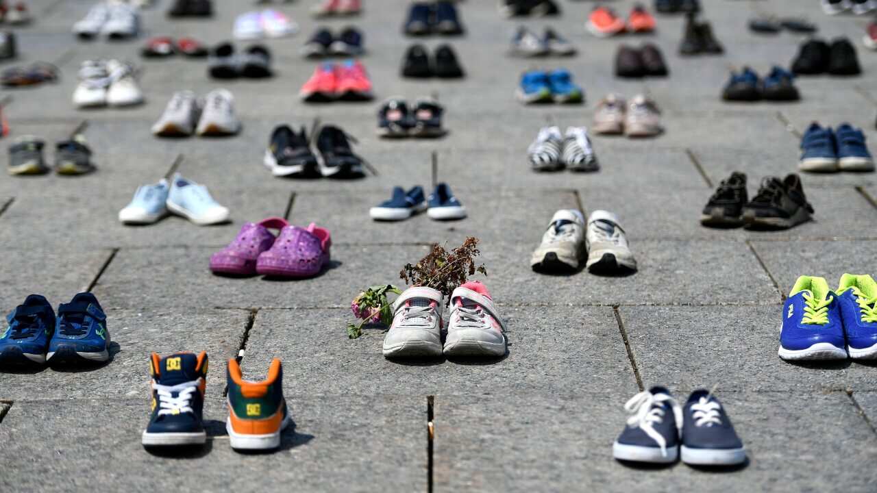 A memorial for the 215 children whose remains were found at the grounds of the former Kamloops Indian Residential School in British Columbia.