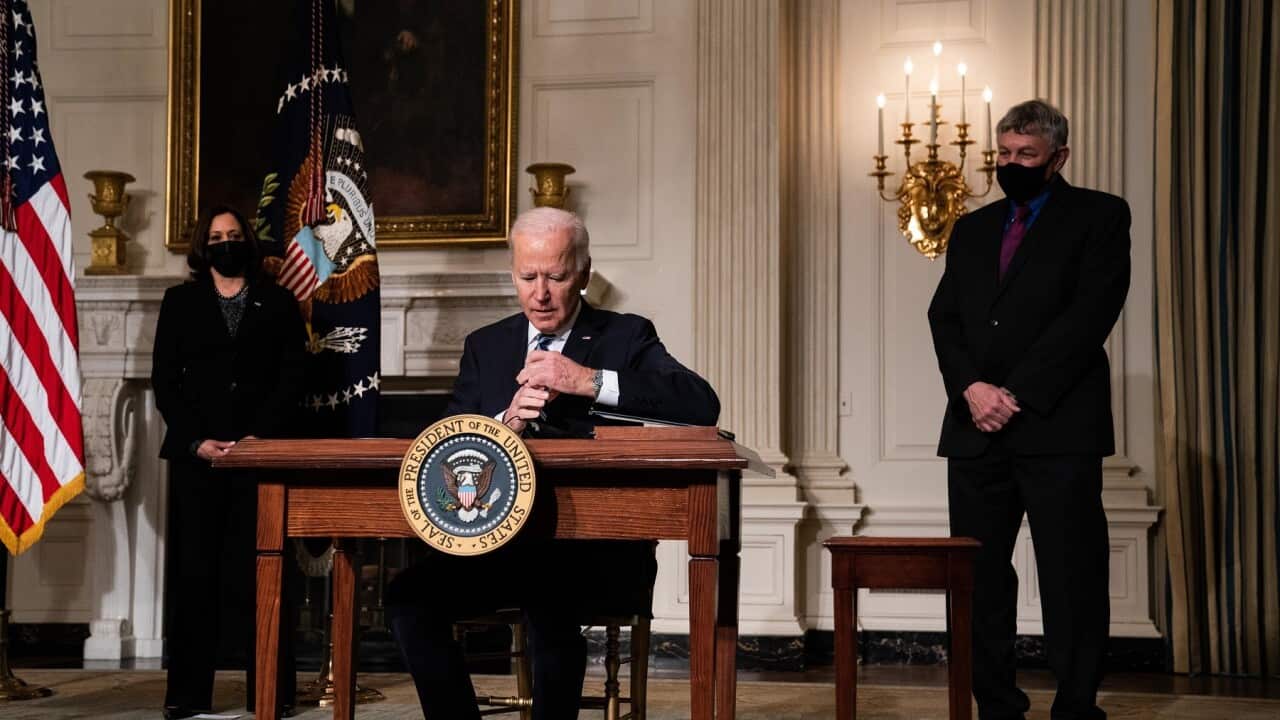 President Joe Biden signs an executive order regarding his administrations response to climate change at an event in the State Dining Room of the White House in Washington DC, January 27th, 2021. (Anna Moneymaker/NYT)