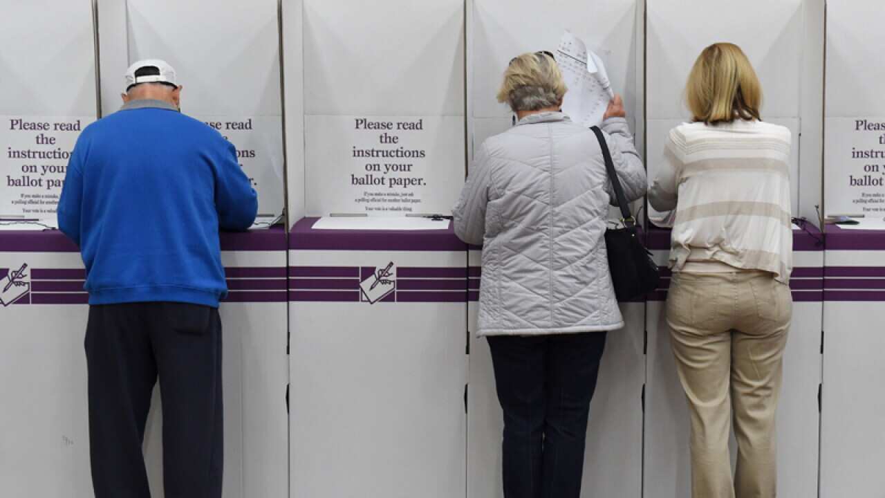Voters cast their ballots