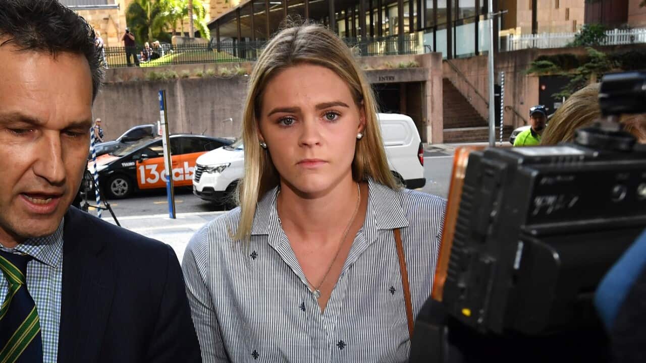 Australian swimmer Shayna Jack arrives at the briefing.