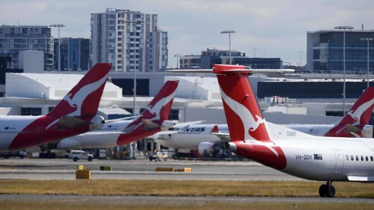 Qantas planes at the airport.