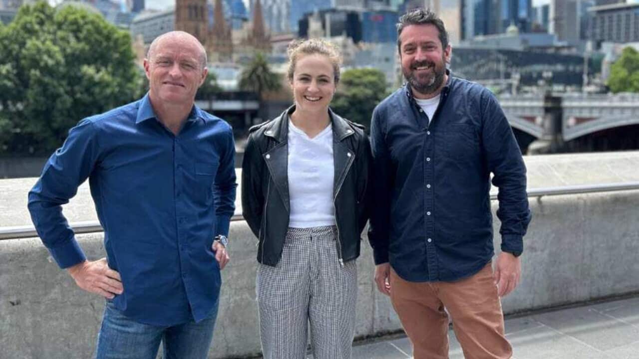 SBS Cycling Podcast host Christophe Mallet (R) alongside David McKenzie (L) and Olympic gold medallist Grace Brown.jpg