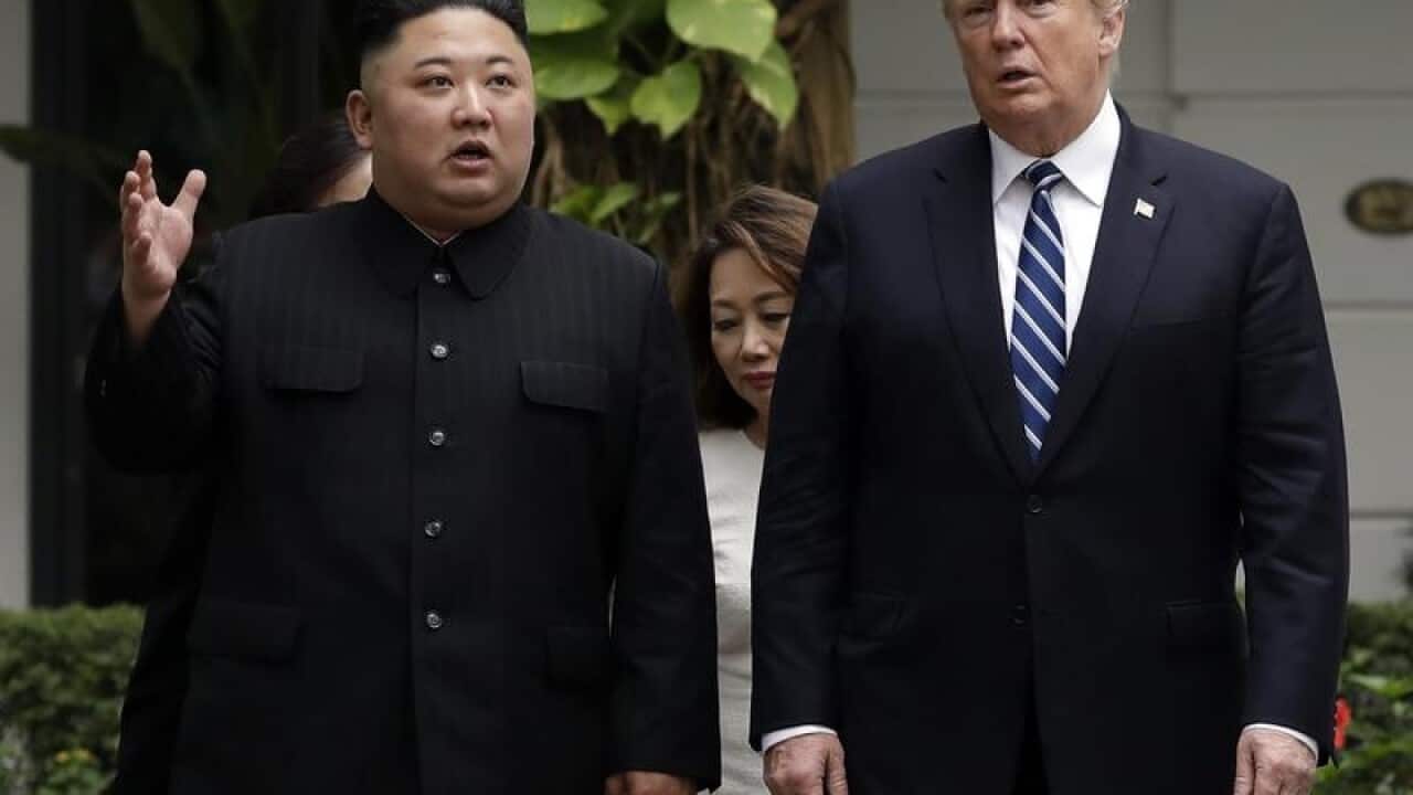 Kim (L) and Trump (R)