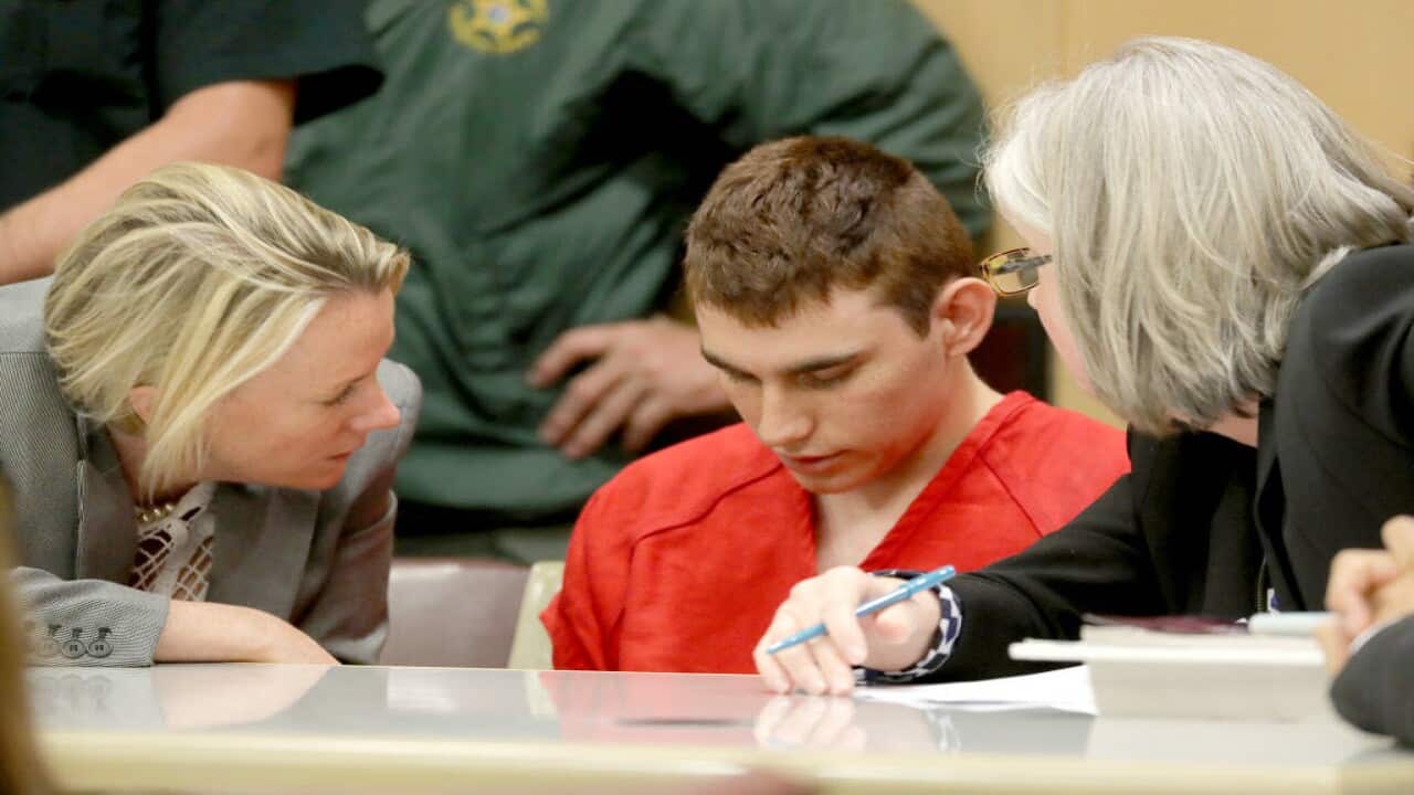 Nikolas Cruz appears in court with attorney Melissa McNeil.