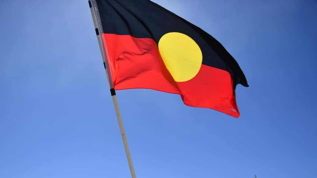 Protestors at an Invasion Day rally at the Aboriginal Tent Embassy