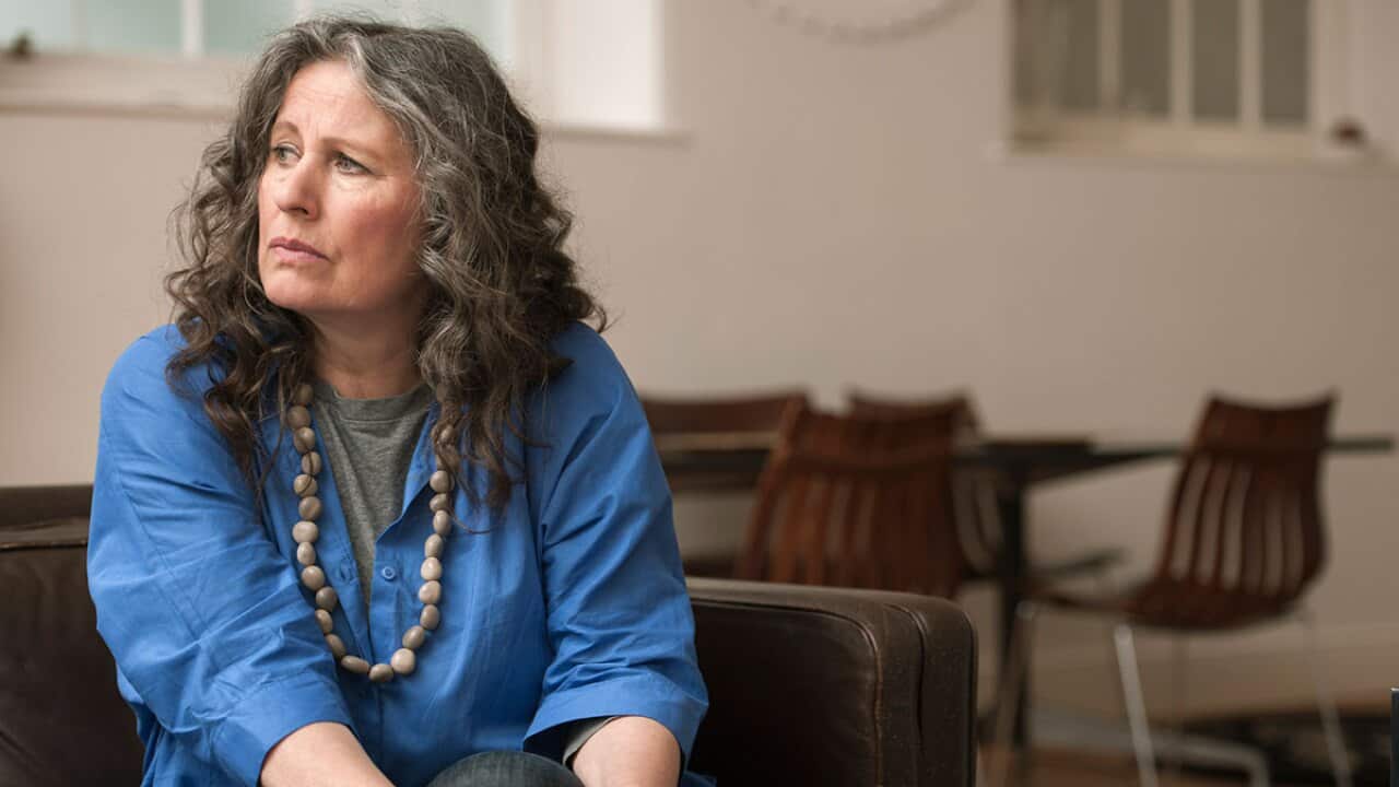 Anxious woman looking into distance