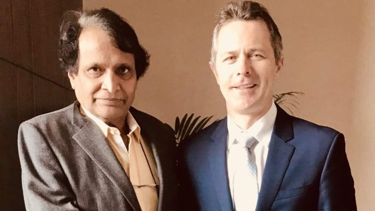 Jason Clare with Suresh Prabhu
