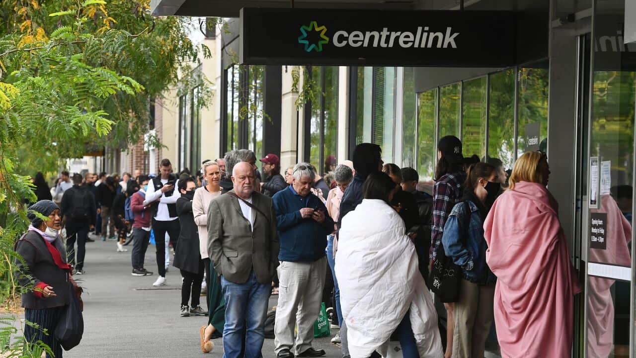 Hundreds of people queue outside a Centrelink in Melbourne amid the coronavirus pandemic.