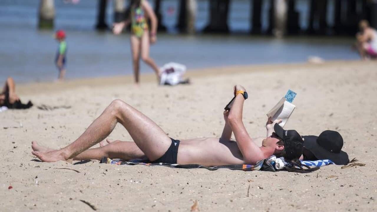 Beachgoers at Port Melbourne