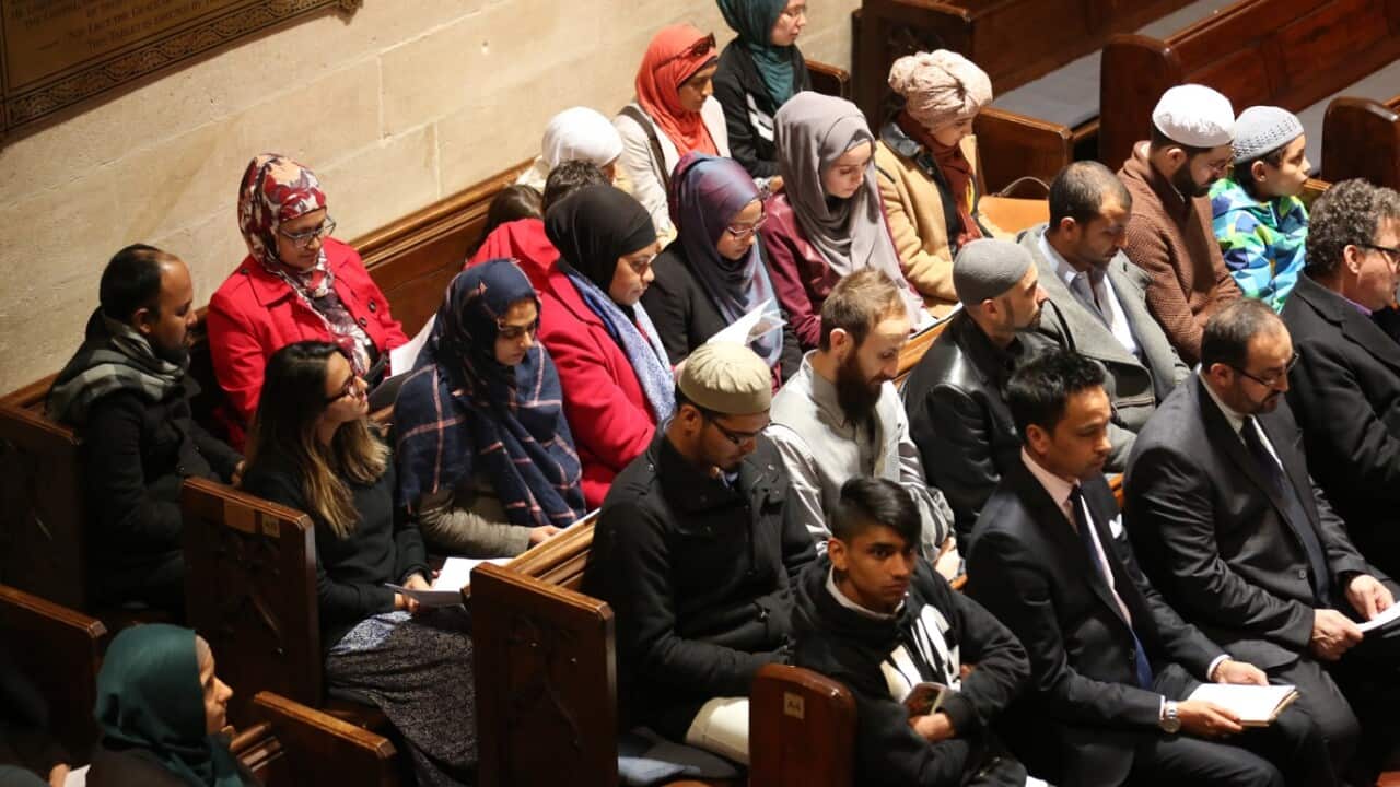 Members of the Muslim community sit together during a church service for the victims and injured from the Orlando nightclub shootings (AAP)