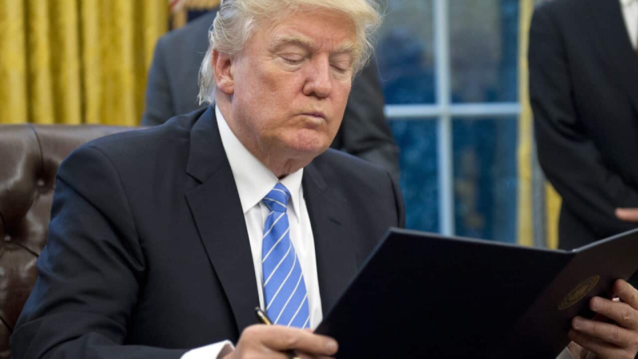 Donald Trump in the Oval Office.