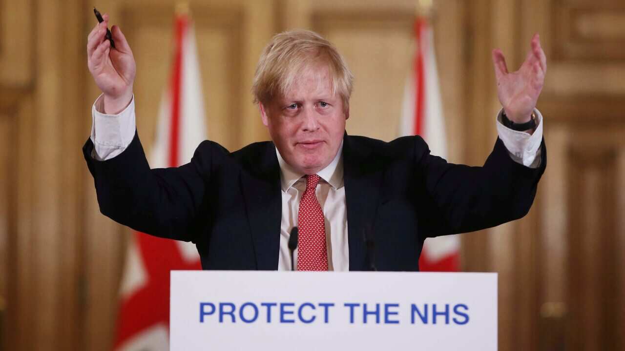 Boris Johnson speaking to reporters before he fell ill (Getty)