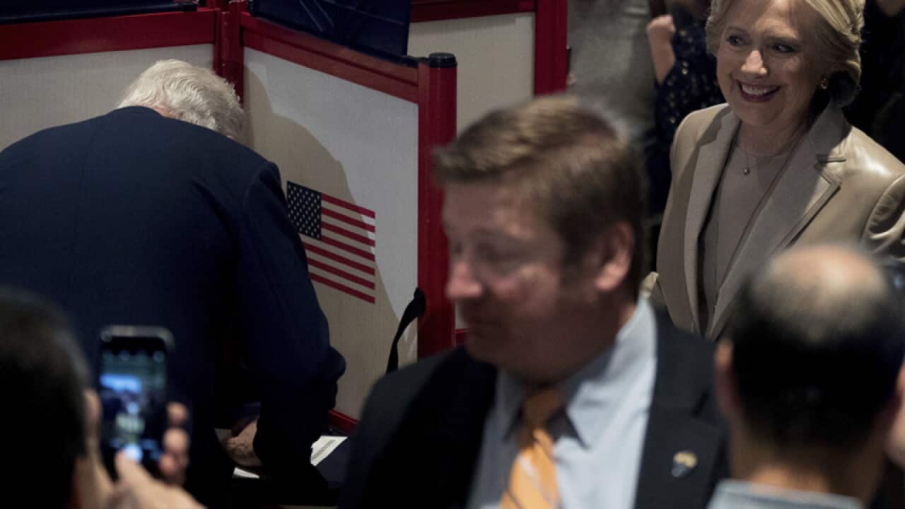 Hillary Clinton and her husband Bill cast their ballots
