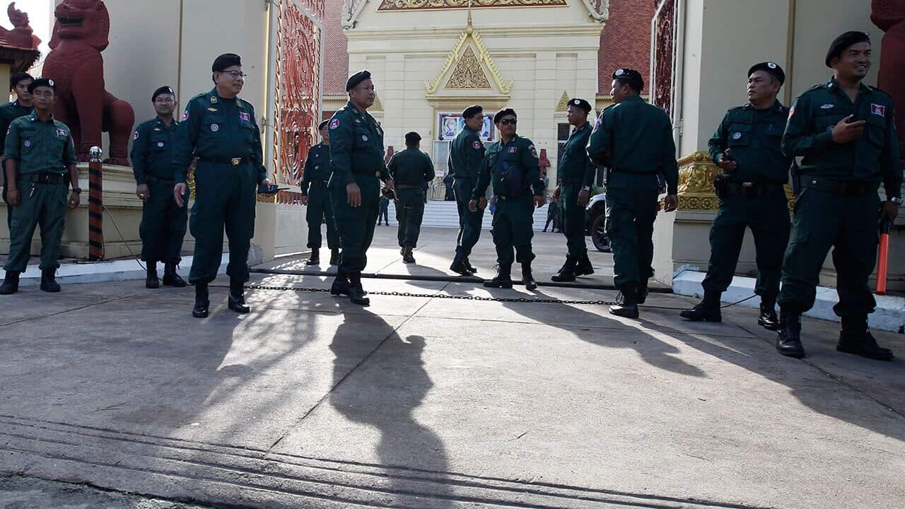 Cambodian police officers stand guard at the Supreme Court in Phnom Penh, Cambodia, 16 November 2017.