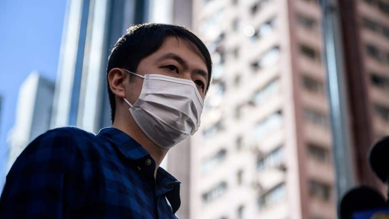 Ted Hui speaks to the media as he leaves the Western Police Station in Hong Kong on November 18, 2020