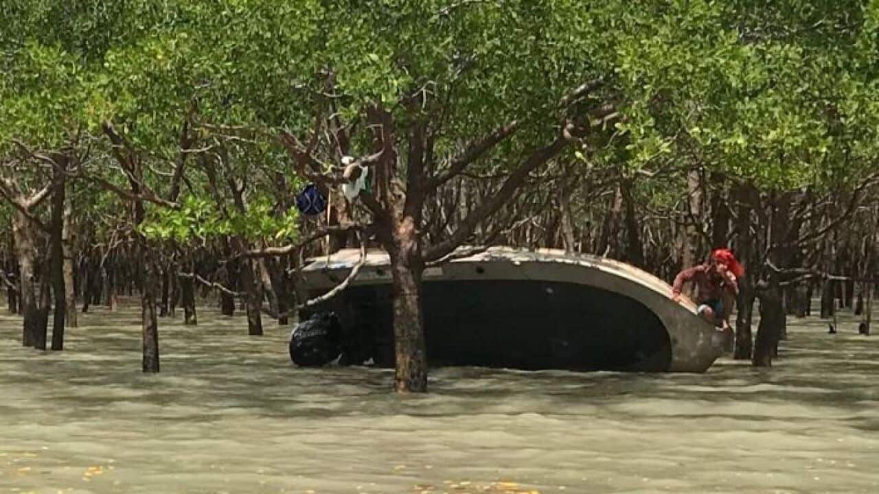The two men spent two days in a tree.