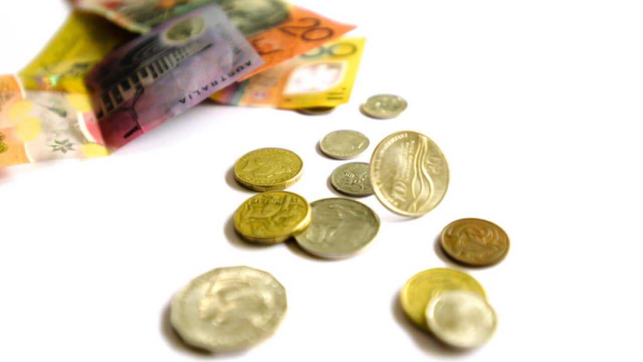 Australian notes and coins are seen in Adelaide, Monday, April 16, 2018. (AAP Image/Morgan Sette)