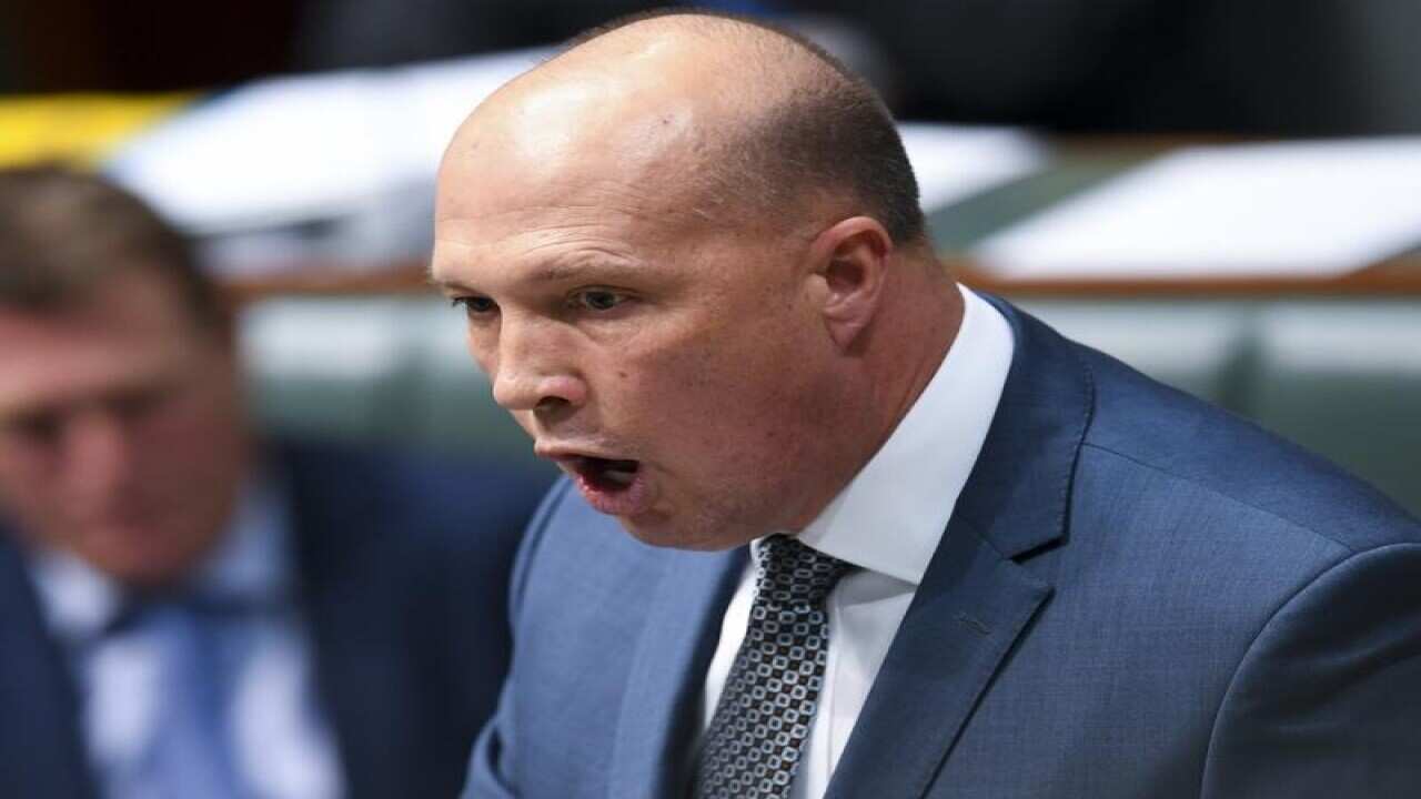 Home Affairs Minister Peter Dutton speaks at Question Time.