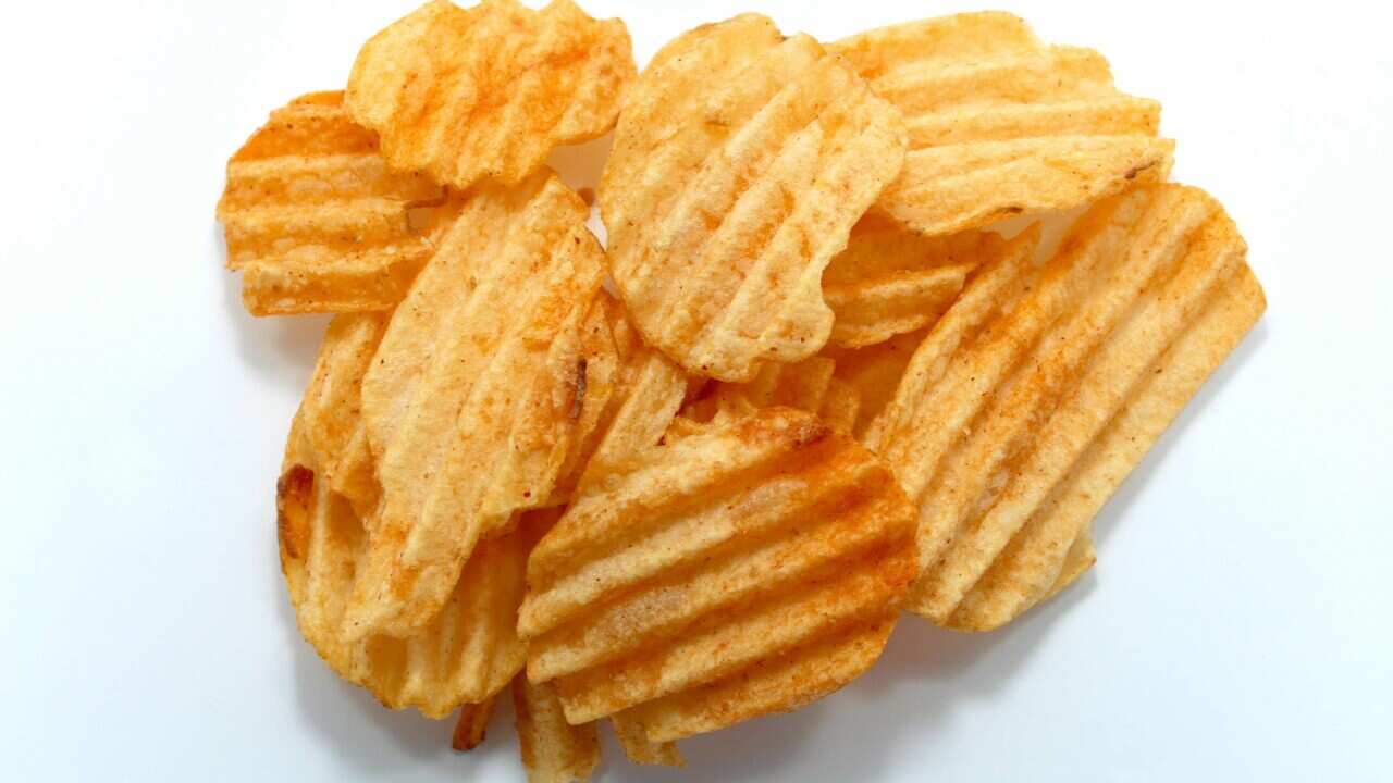 Snack Potato Chips Heaps On A White Back