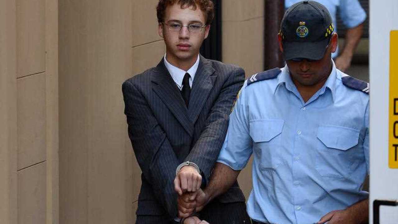 Daniel Kelsall is led to a Corrective Services prison van as he leaves after giving evidence at the NSW Supreme Court, in Sydney, Monday, March 16, 2015. (AAP)