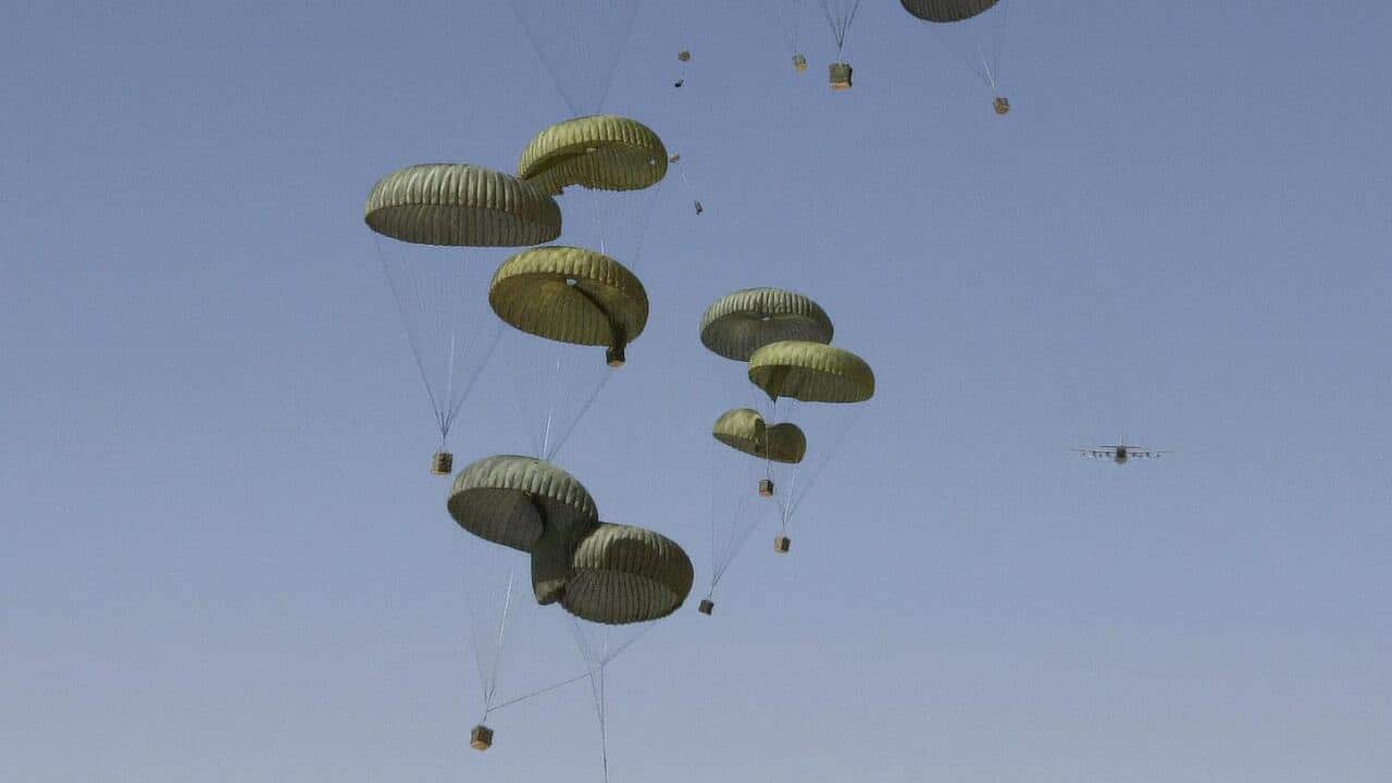 Britain has commenced air drops of rations to refugees in Iraq. (AAP)