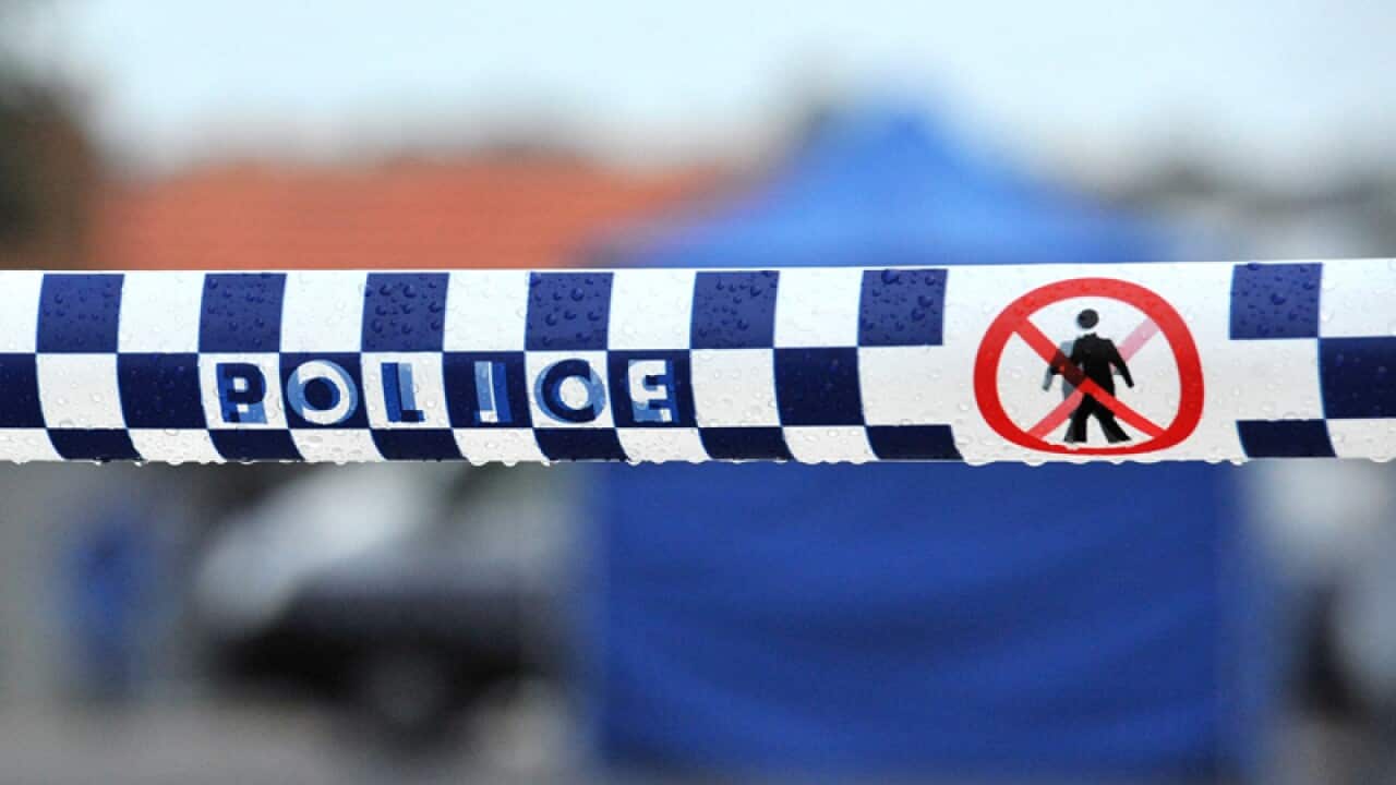 Police tape restricts access